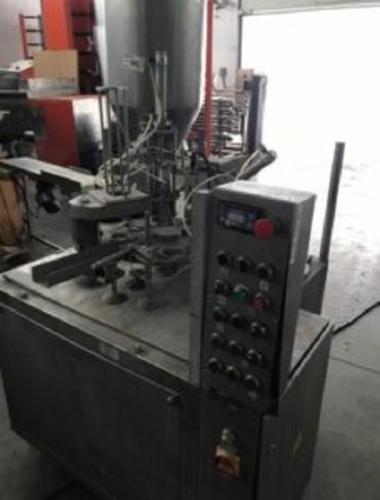 Продается Фасовочный автомат творога в стаканчики,